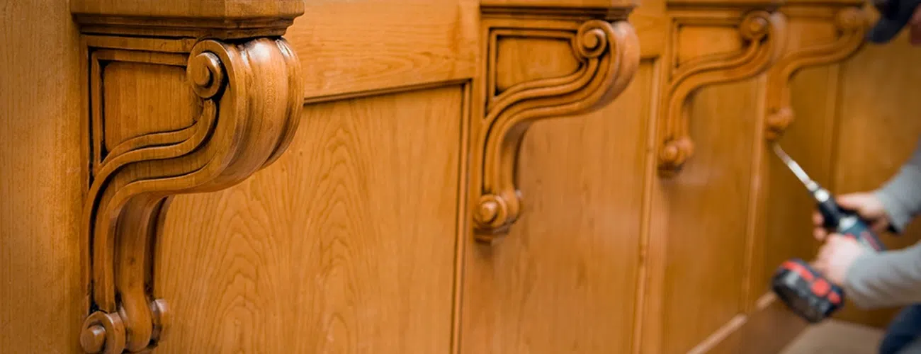 Custom wood cabinetry and decorative millwork installation for commercial interiors