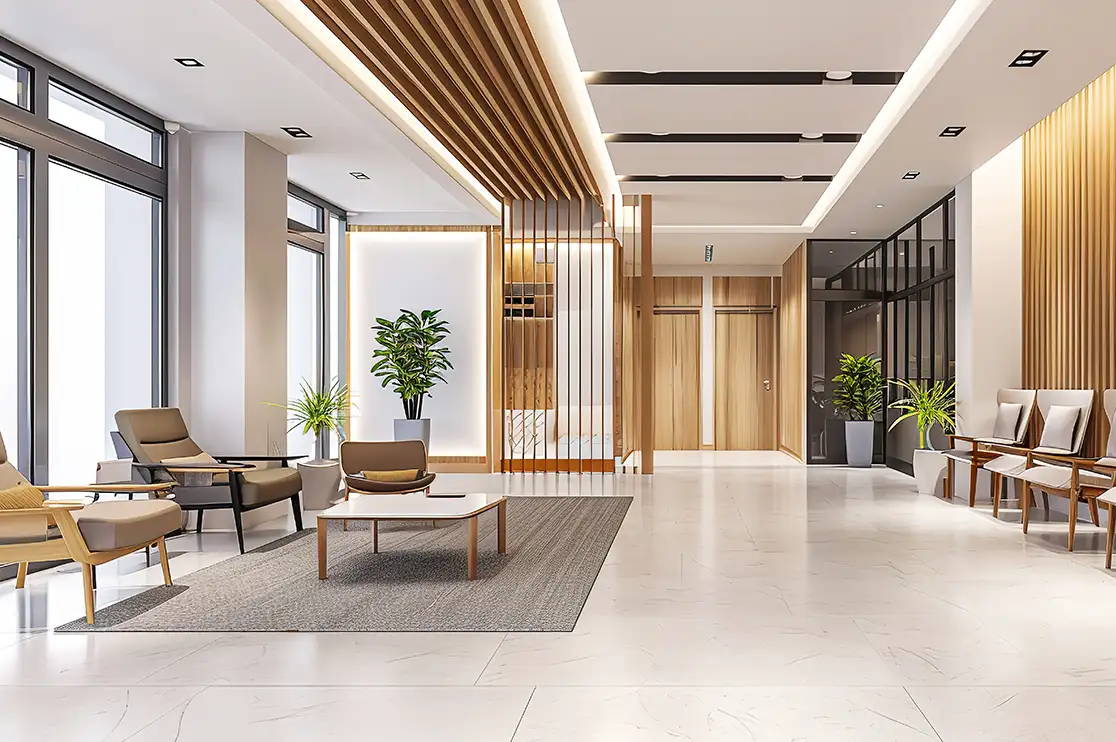 Hospital waiting area featuring decorative wood-slat wall paneling, custom millwork partitions, and modern patient seating.
