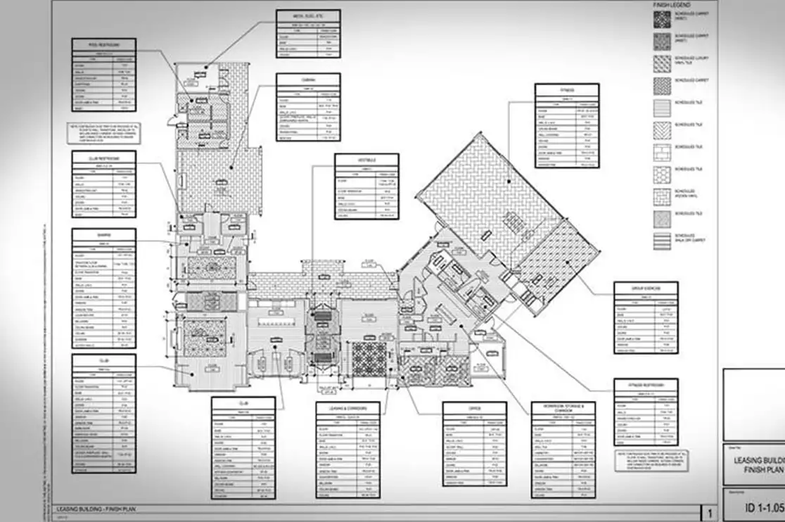 Detailed interior construction drawing showing millwork layouts, wall elevations, shelving dimensions, and furniture placement for multifamily and senior living facilities.