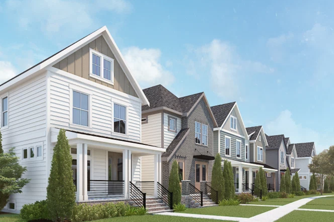 Photorealistic 3D rendering of a residential community with multiple modern homes, landscaped front yards, sidewalks, porches, pitched roofs, and tree-lined streets.